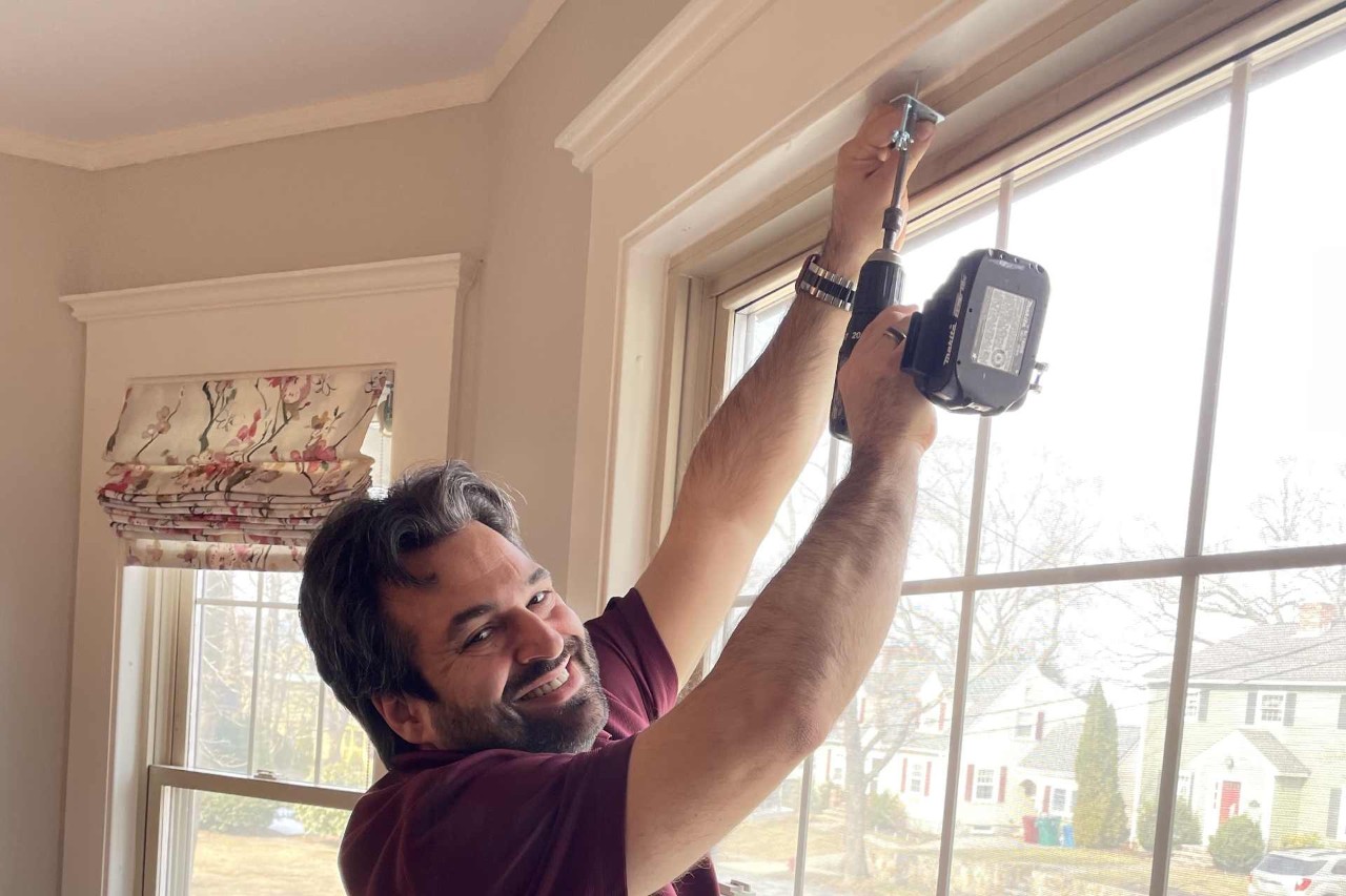 Custom Hunter Douglas Window Treatments being installed at an in-home consultation near Westford, Massachusetts (MA)